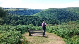 charlottefolkes2042exmoor-national-park-somerset-england-alex-is-stood-at-webbers-post-looking-out-at-the-beautiful-panoramic-view-of-horner-woods-a-draw-dropping-view-that-showcases-some-of-engl